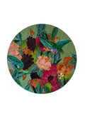 Round floral artwork on a white wall
