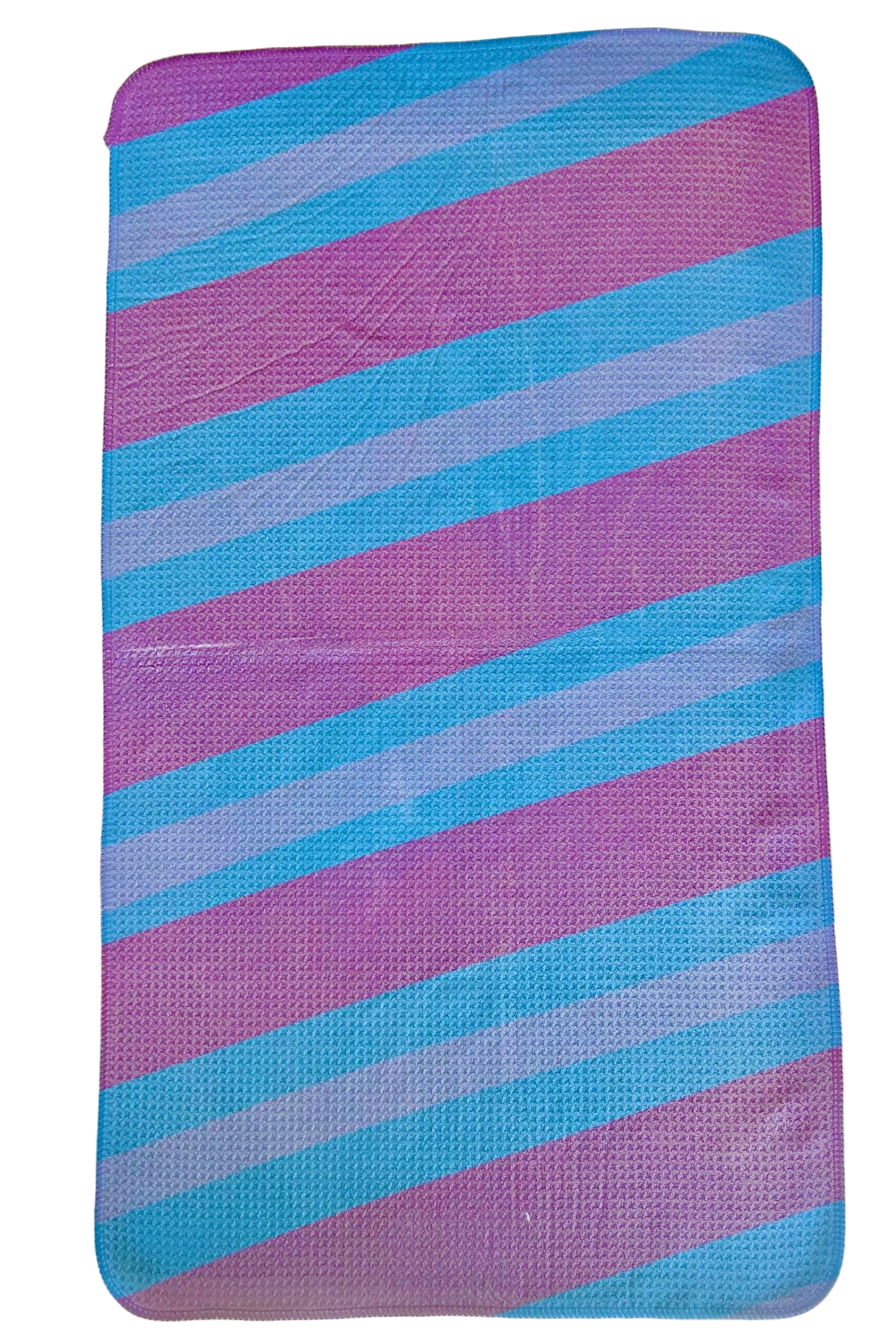 Purple and blue striped towel on a white background