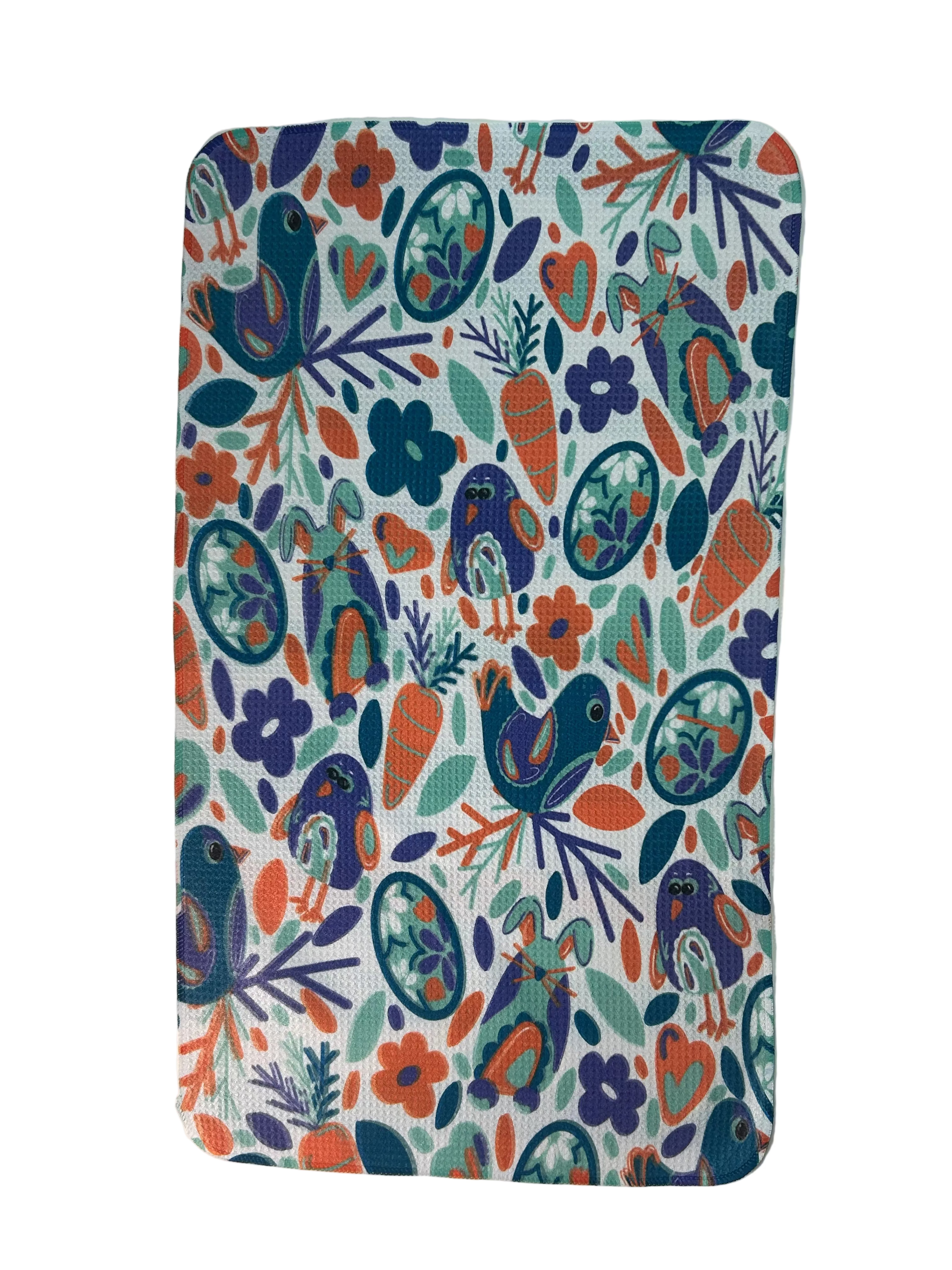 Colorful patterned mat with birds and floral designs on a white background