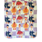 Porch geese tea towel on checkered backgroup.
