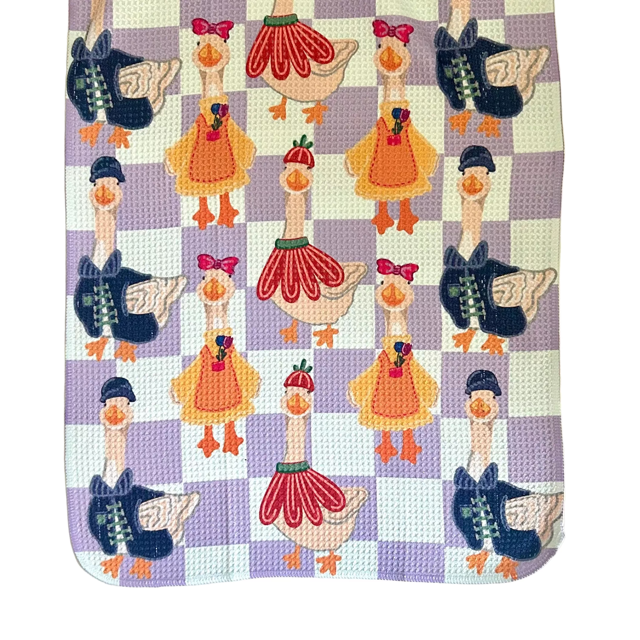 Porch geese tea towel on checkered backgroup.