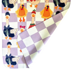 Checkered towel with porch geese design on a white background