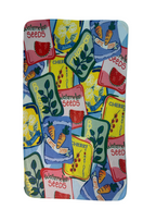 Colorful patchwork of seed packets on a white background