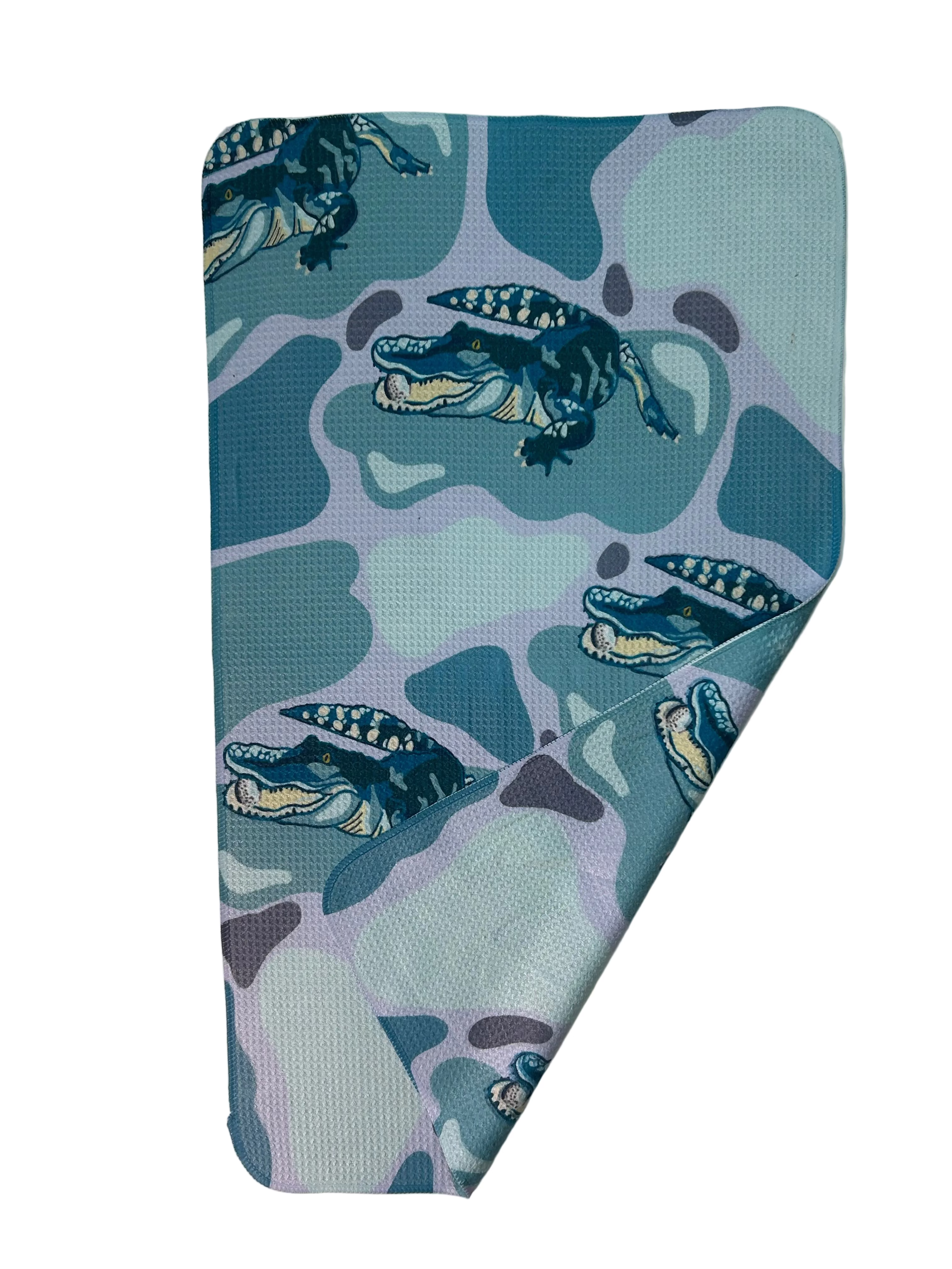 Towel with golfing gator in blue and violet.