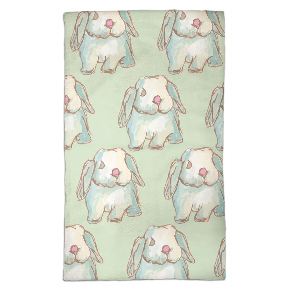 Tea towel hand designed by Jessica Reynolds art. Featuring water color bunnies on a microfiber towel with a terri loop backing.